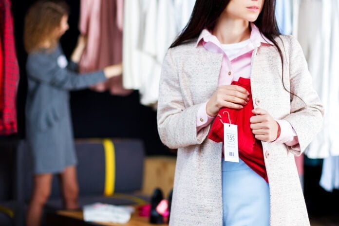 FEMALE CUSTOMER ATTEMPTS TO SHOPLIFT