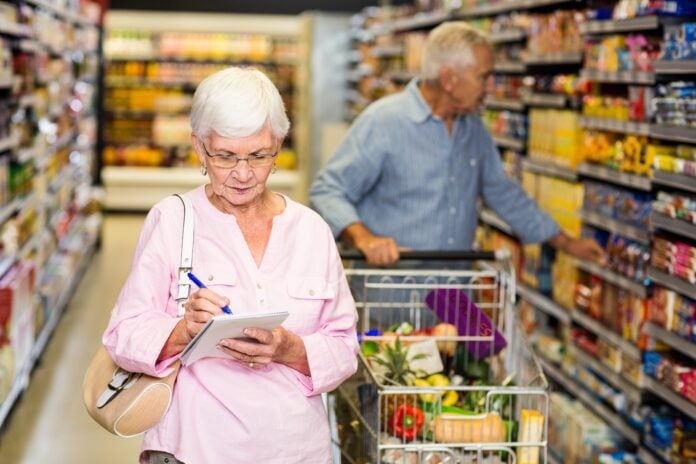 Senior woman with shopping list