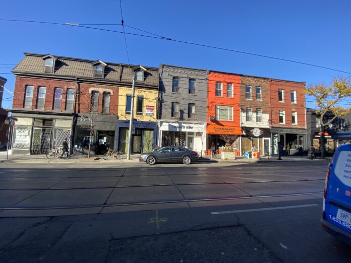 Row of small retailers on Toronto's Queen Street West. Photo: Dustin Fuhs