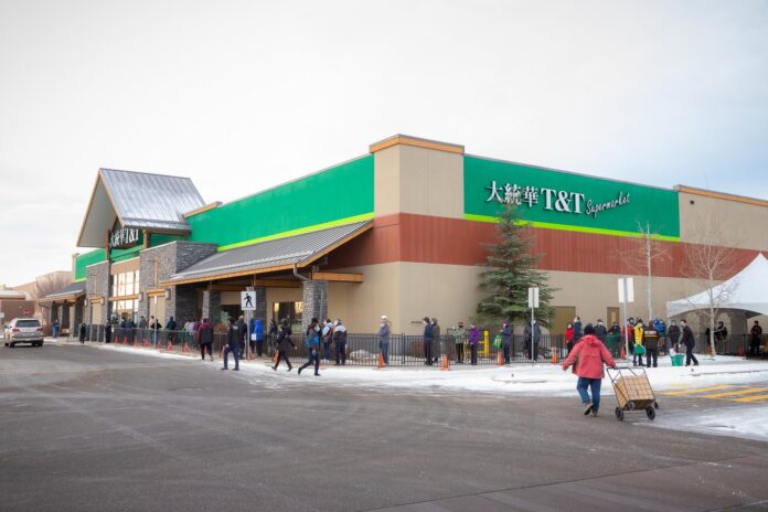 TT- Supermarket Exterior of new Deerfoot Meadows T&T Supermarket with lineups of people waiting to enter. Photo: T&T Supermarket