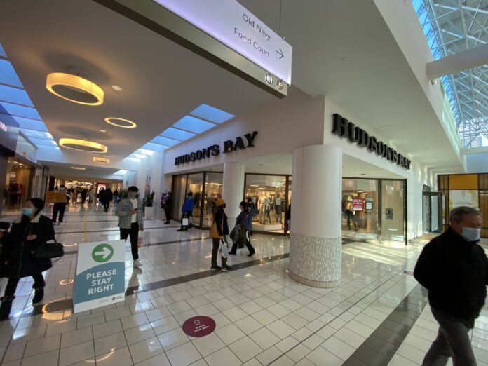 guildford-mall-hudsons-bay Shoppers outside Hudson's Bay at Guildford Mall. Photo: Lee Rivett