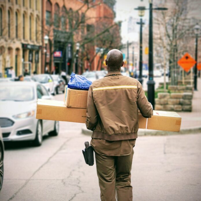 Delivery man with packages