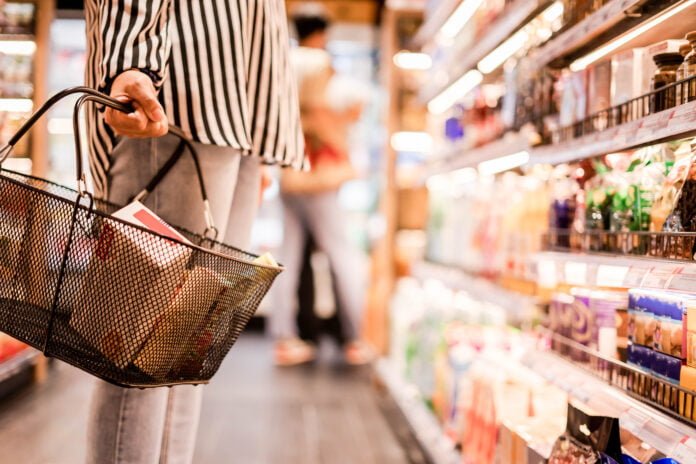 Women choosing products in supermarkets, ready-to-eat food, shopping Women choosing products in supermarket.
