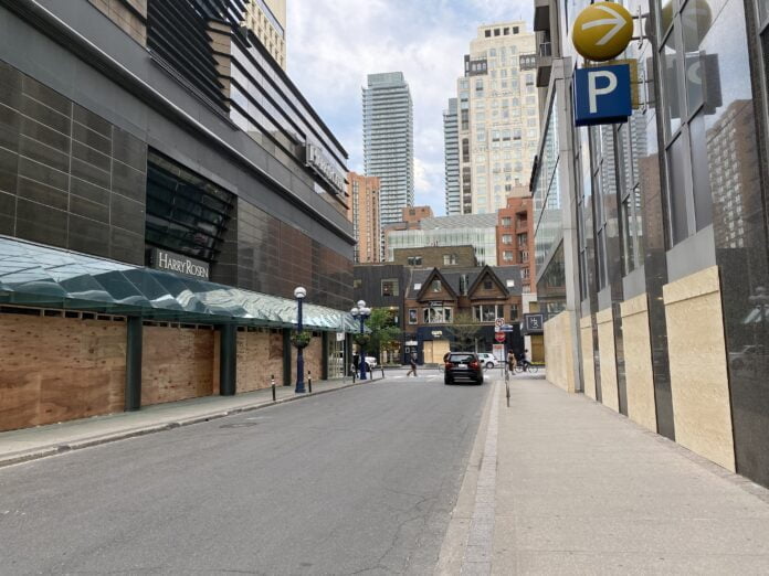 IMG_5757 Exterior of a boarded up Harry Rosen in Yorkville - Photo taken by Craig Patterson Spring 2020