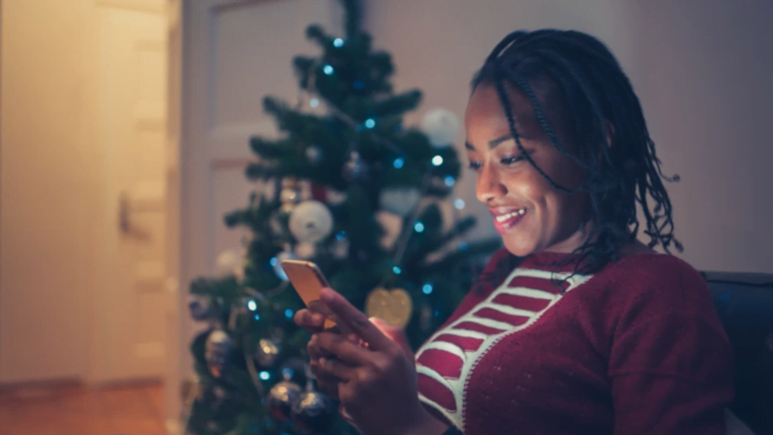 Woman shops online during the holiday period. Photo: Salesforce Woman shops online during the holiday period. Photo: Salesforce