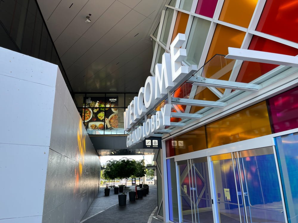 The Grand Lobby entrance with the pedestrian overpass to "The Rec Room" entrance (June 2021).