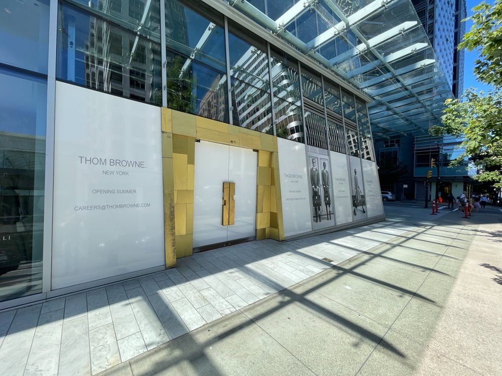 Future Tom Browne location with construction signage just off of Alberni Street in Vancouver (June 2021).