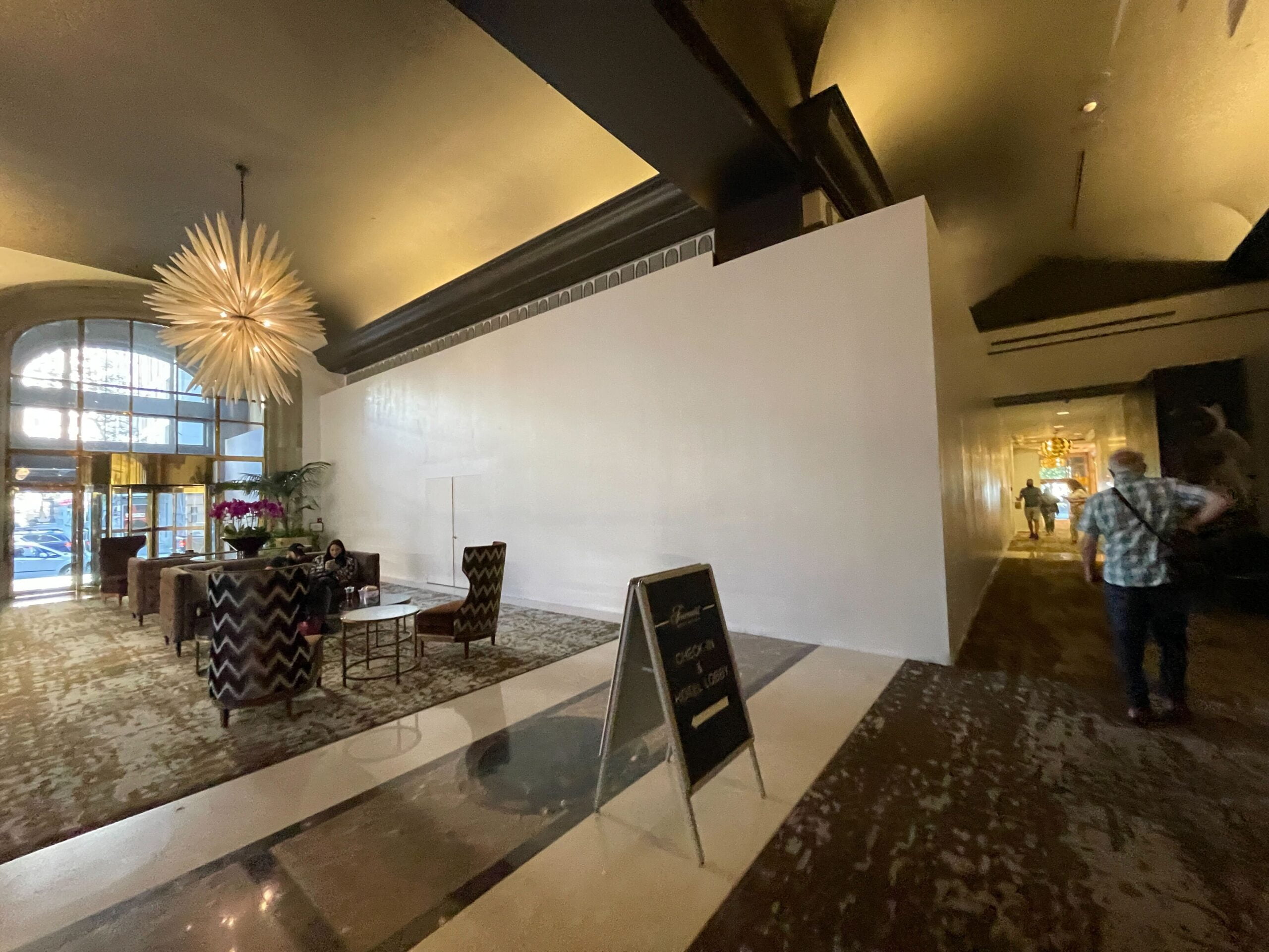 Former interior OMEGA with construction boarding erected at Fairmont Hotel Vancouver (September 2021)