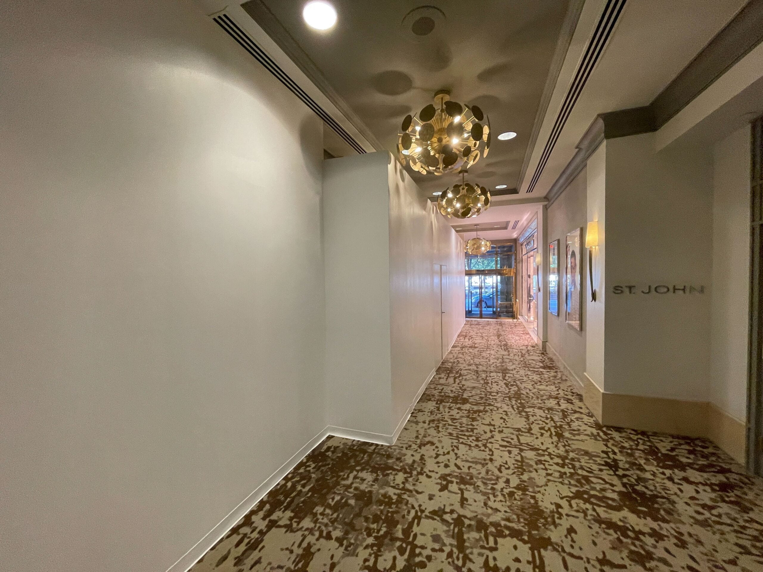 Former interior Gucci entrance with construction boarding erected at Fairmont Hotel Vancouver (September 2021)