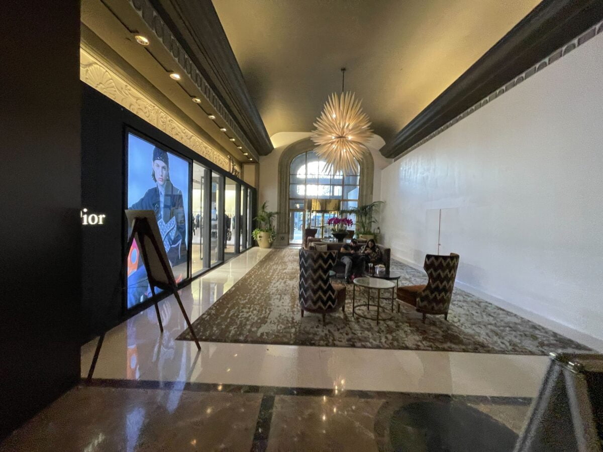Former interior OMEGA entrance (across from Dior) with construction boarding erected at Fairmont Hotel Vancouver (September 2021)