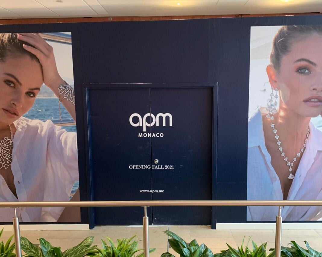 Construction signage for APM Monaco at CF Pacific Centre (October 2021)