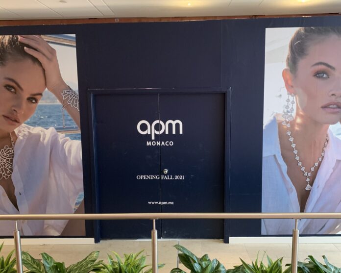 Construction signage for APM Monaco at CF Pacific Centre (October 2021)