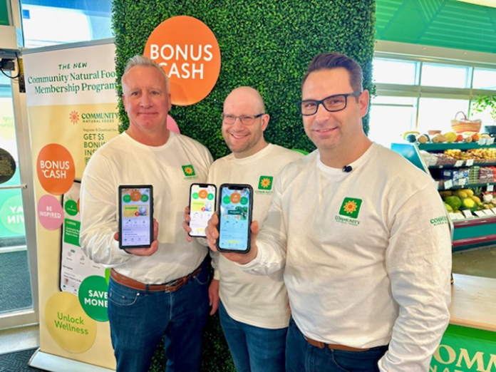 Community Natural Foods Left to Right: Rob Naff, Managing Director, Home Health Care & Community Natural Foods, Matt Penner, Director of Operations and Merchandise, Community Natural Foods and Damon Tanzola, Senior Vice-President, Real Estate and Health & Wellness, Calgary Co-op and Community Natural Foods, pose with the new app.