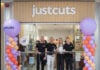 Just Cuts global team at grand opening for first Canadian salon